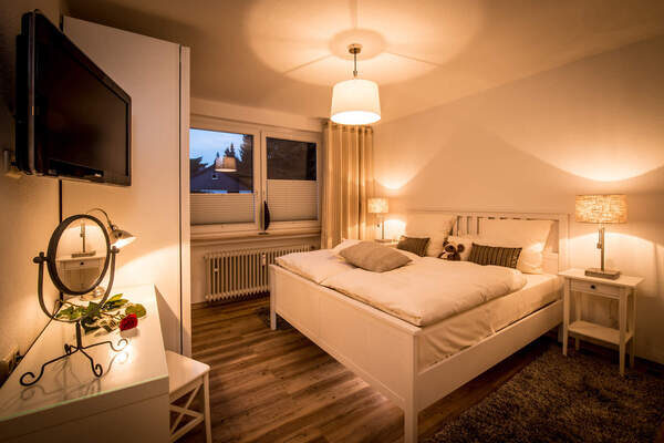 Schlafzimmer im RoWissimo Appartement