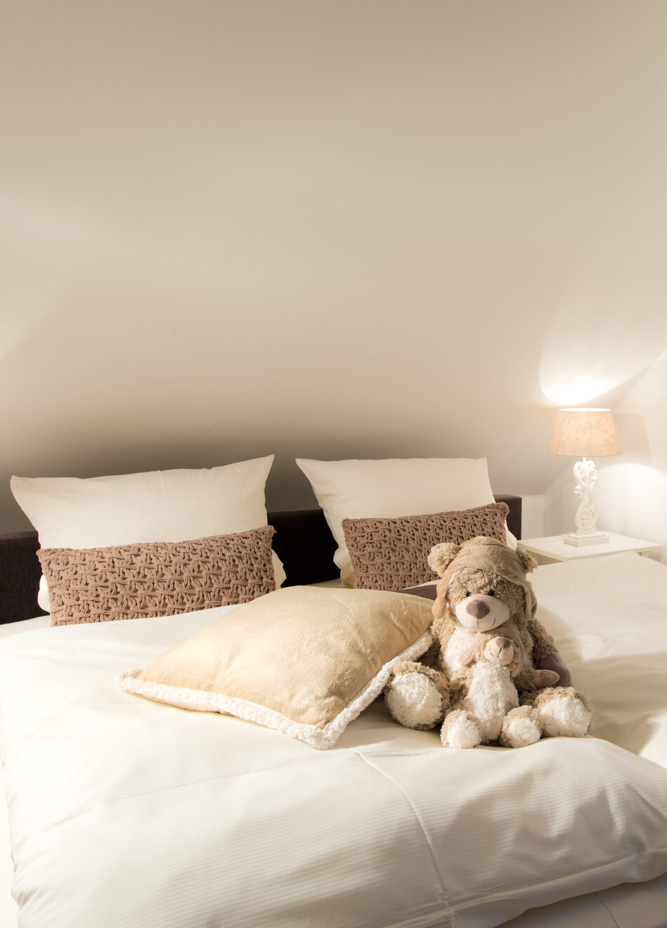 Bett im Wohlfühl-Appartement