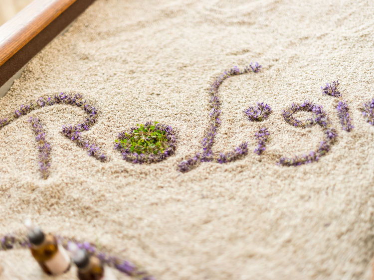 Roligio® massage in a warm sand bed